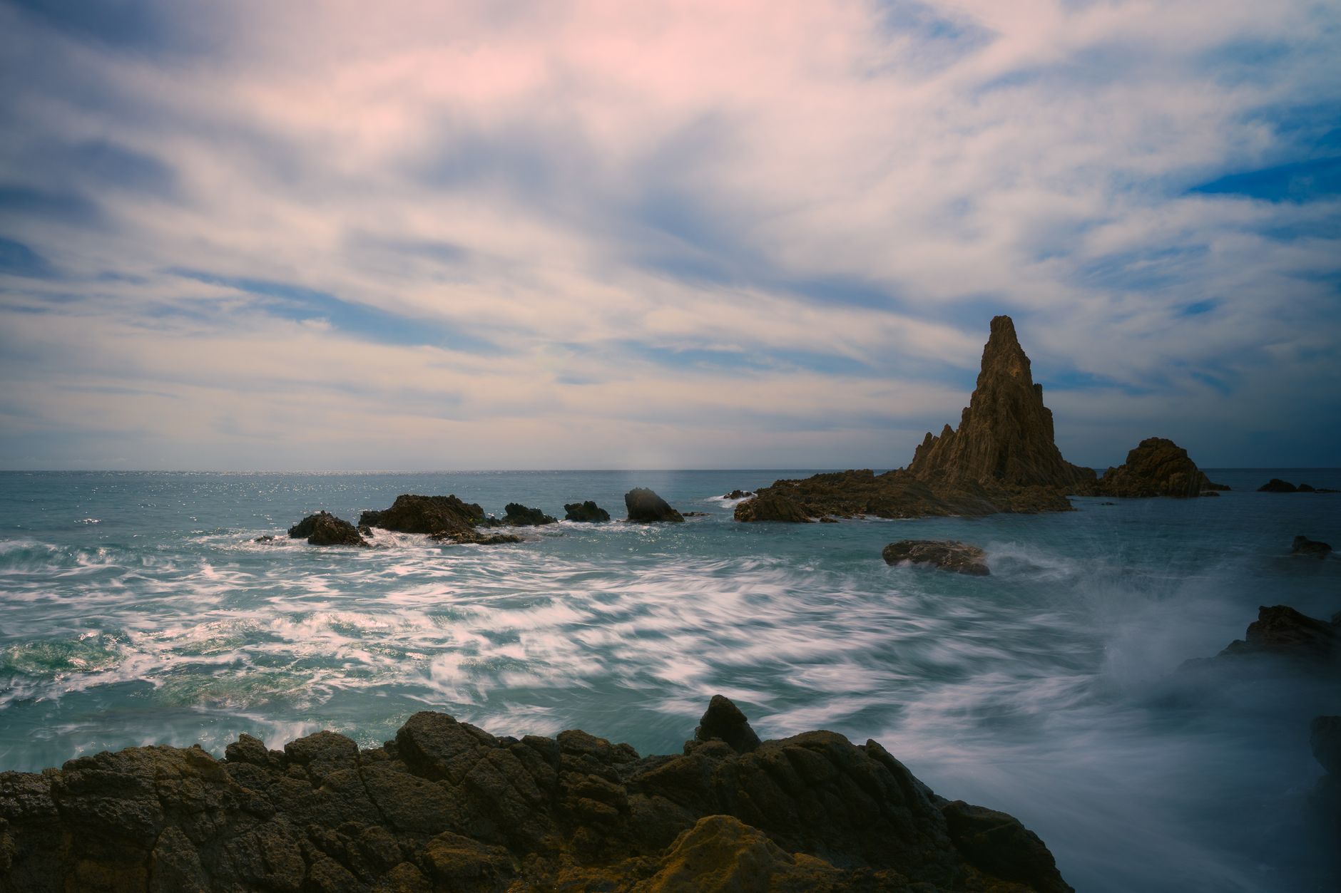 Seascape with dramatic rocky formations near Almería, Spain at sunset.