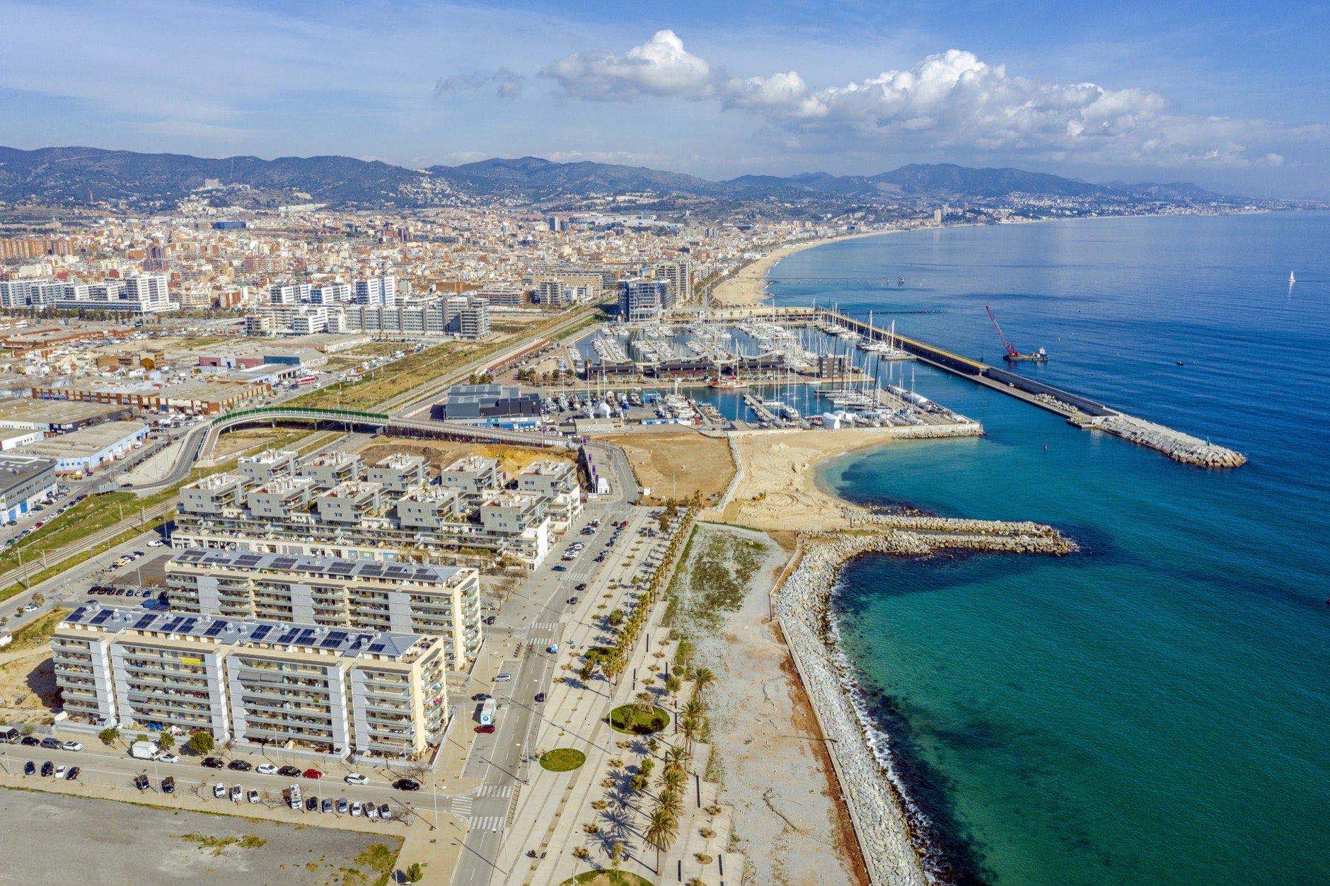Aerial view of Badalona with port detail. Province Barcelona Spain
