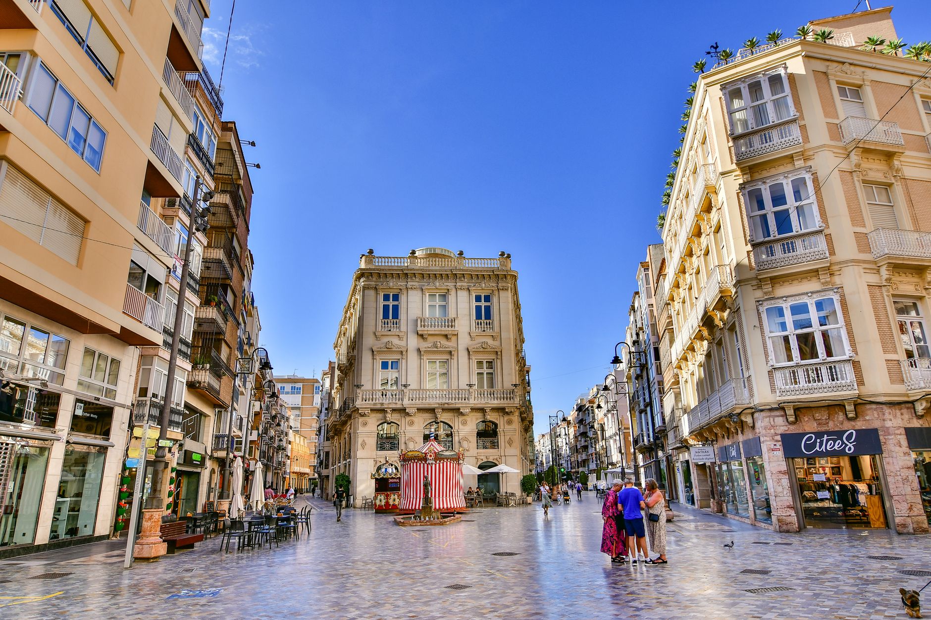 Street view in Cartagena, Spain showcasing classic architecture and atmosphere.