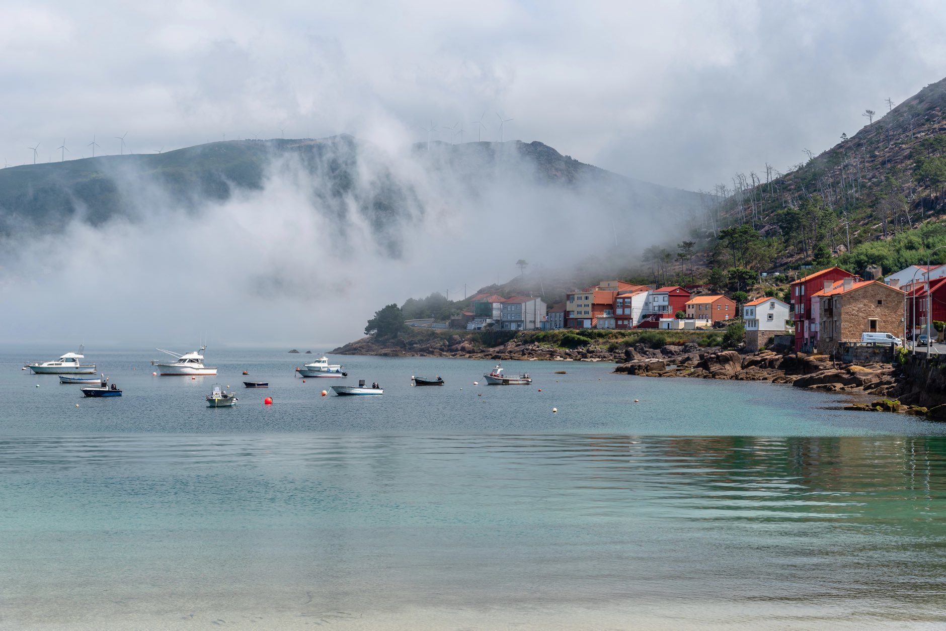 The harbour of O Pindo, a village in Costa da Morte or Death Coast in the Northern Spain. Misty day of summer