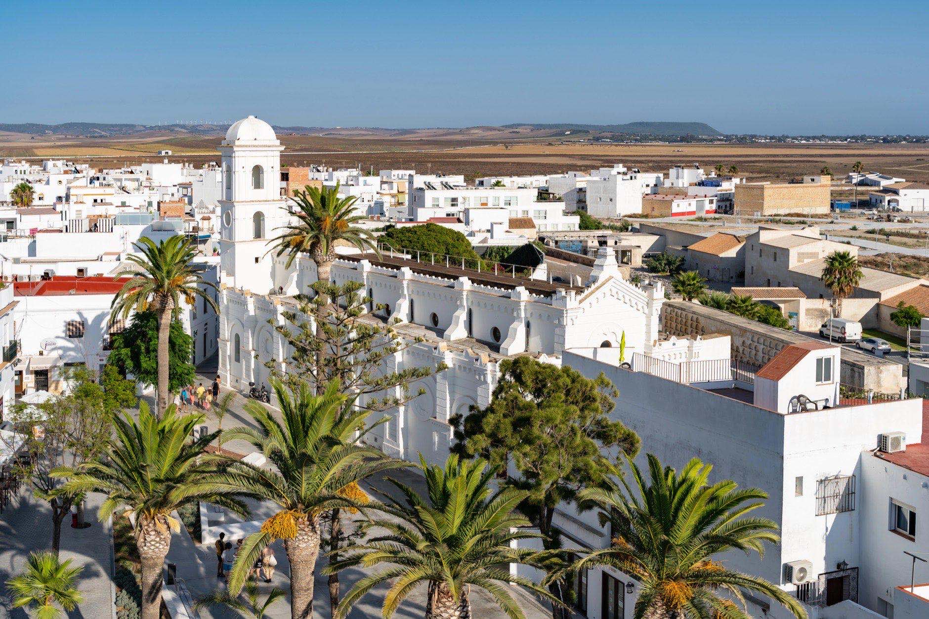 An aerial view of the traditional white buildings of the Conil de la Frontera town in Cadiz, Spain