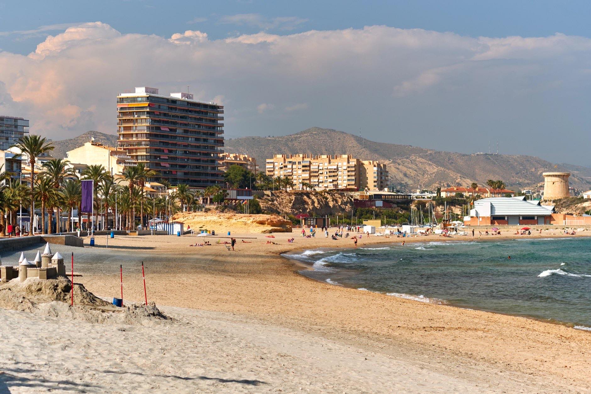 Sandy beach and cityscape El Campello. El Campello is a coastal resort town on the Costa Blanca. Alicante, Spain