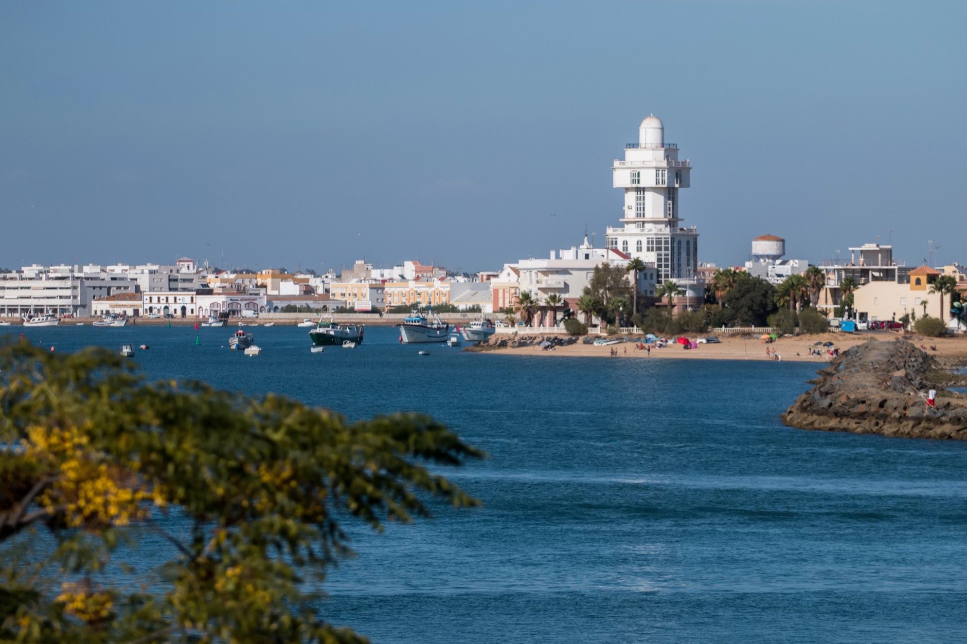 Summer view of the calm water with blue sky near Isla Cristina, Spain.
