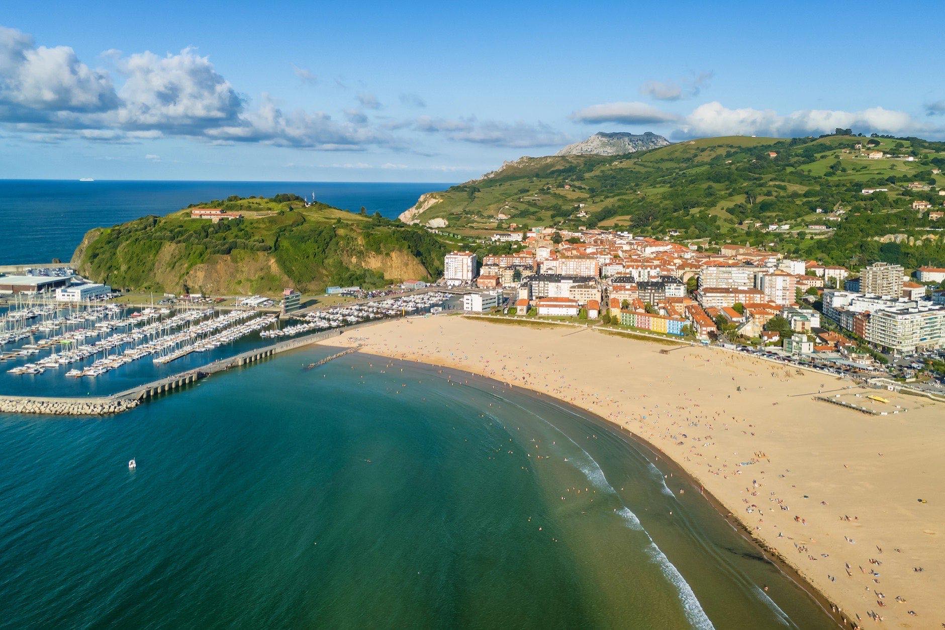 Aerial view of the Laredo, Cantabria, northern Spain. Playa La Salve de Laredo beach in summer. travel destination in North of Spain. Sandy beach and marina