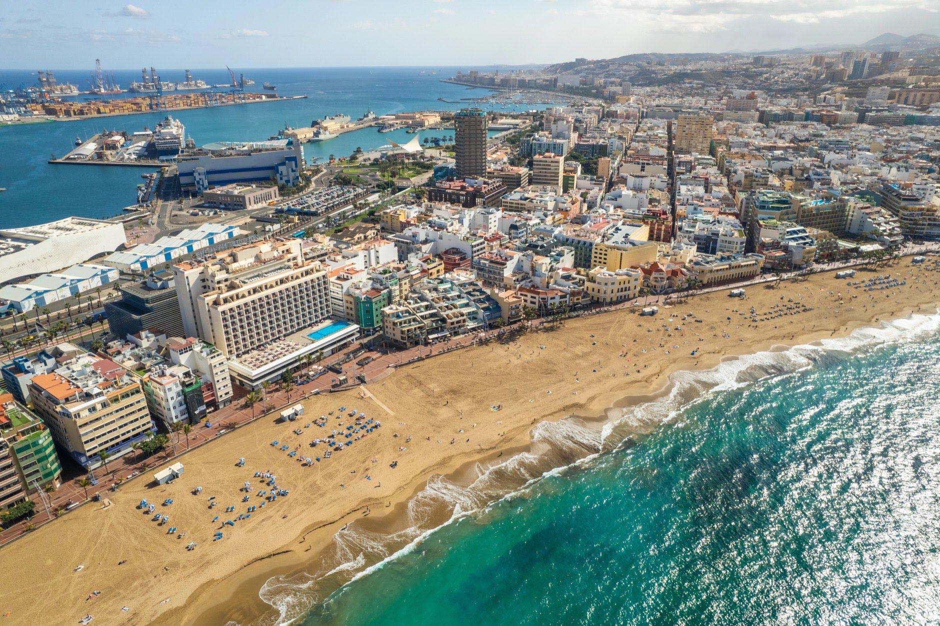 Playa de Las Canteras beach in Las Palmas town, Gran Canaria, Spain. Aerial view of Las Palmas de Gran Canaria, the capital city of the Canary Islands.