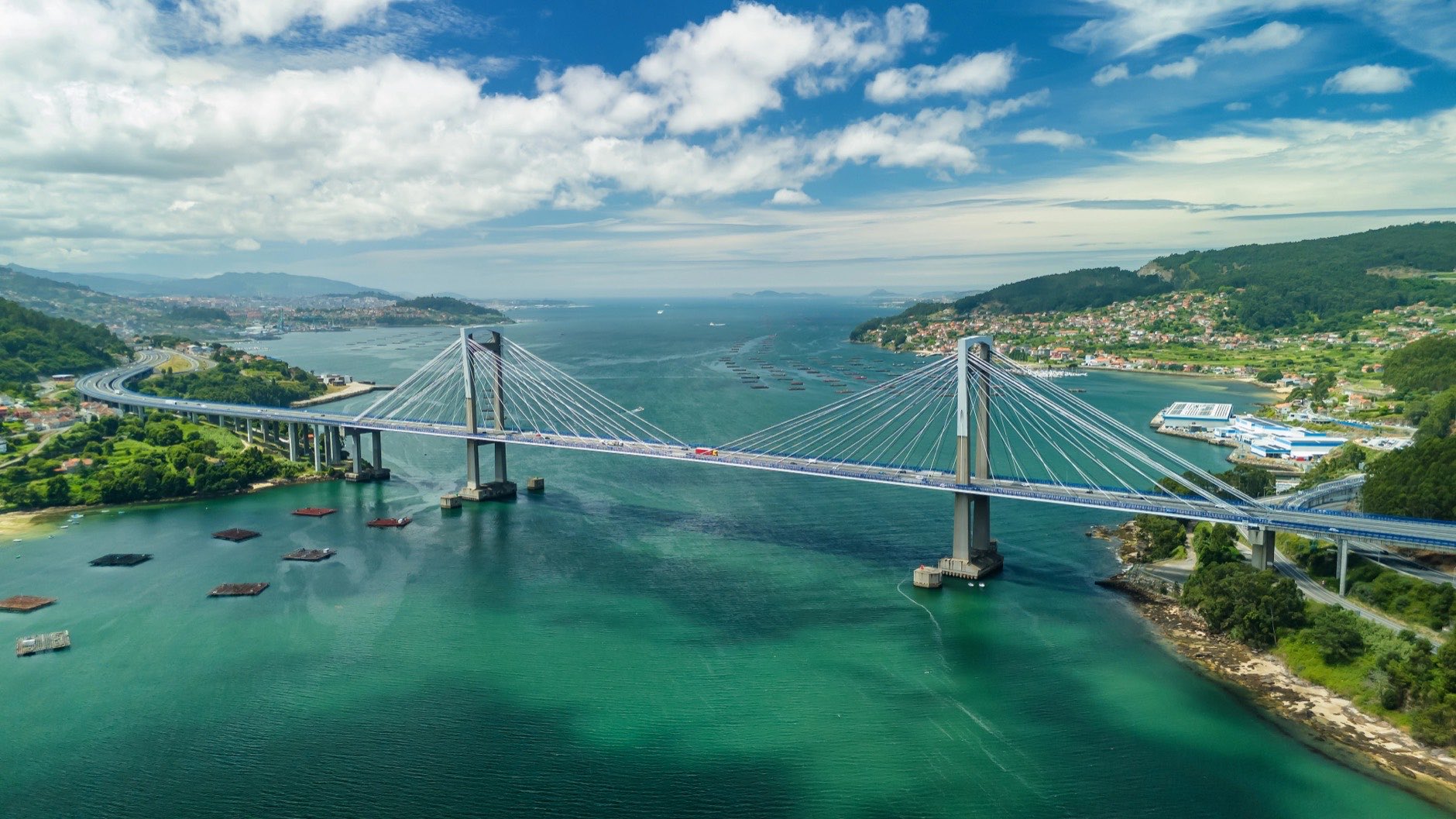 Aerial view of the Rande Bridge in summer, a cable-stayed structure near Vigo in Pontevedra, Spain. Spanning the Rande Strait across Vigo Bay.