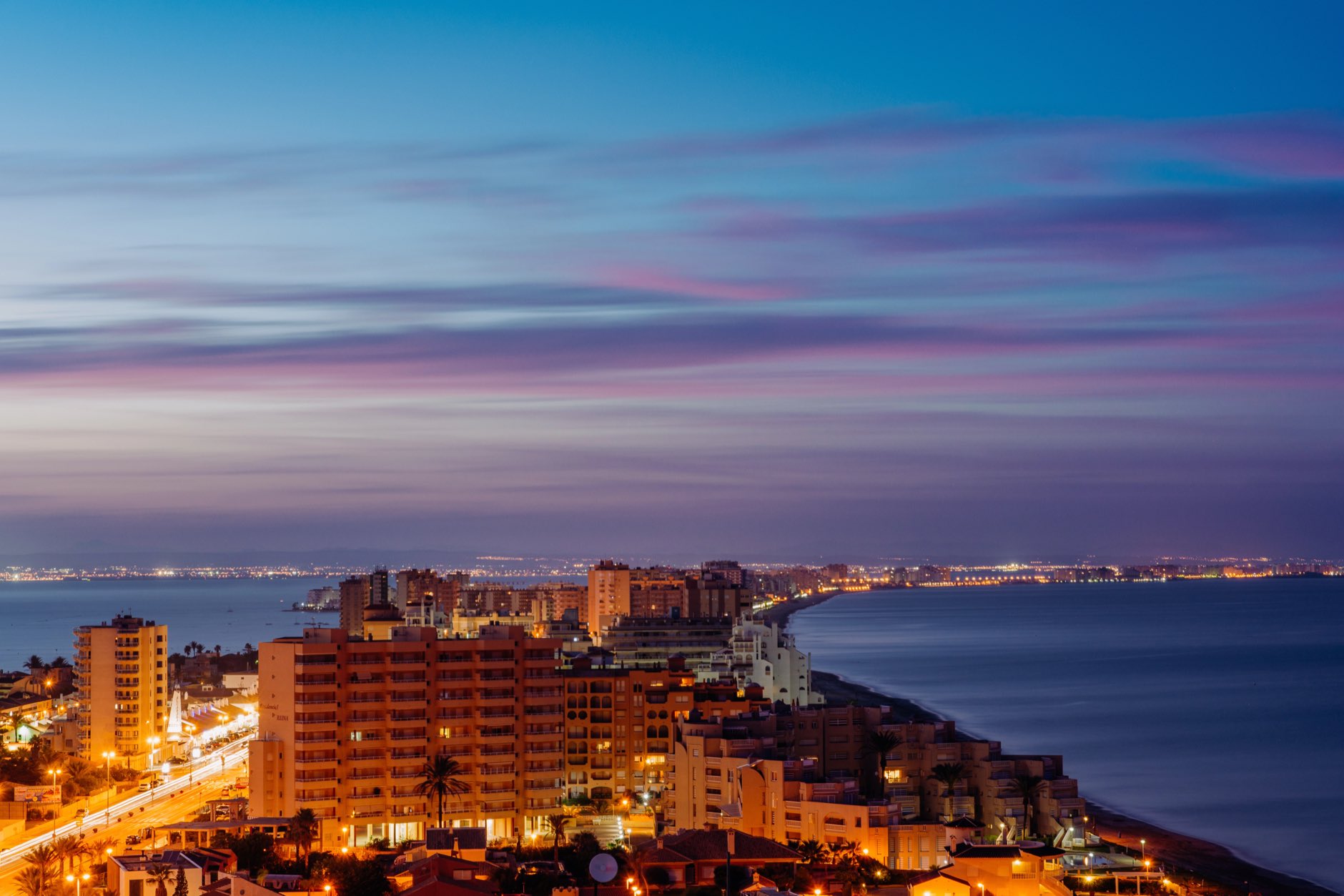 A view of Mar Menor sea and the Mediterranean Sea at night in San Javier, Murcia, Spain