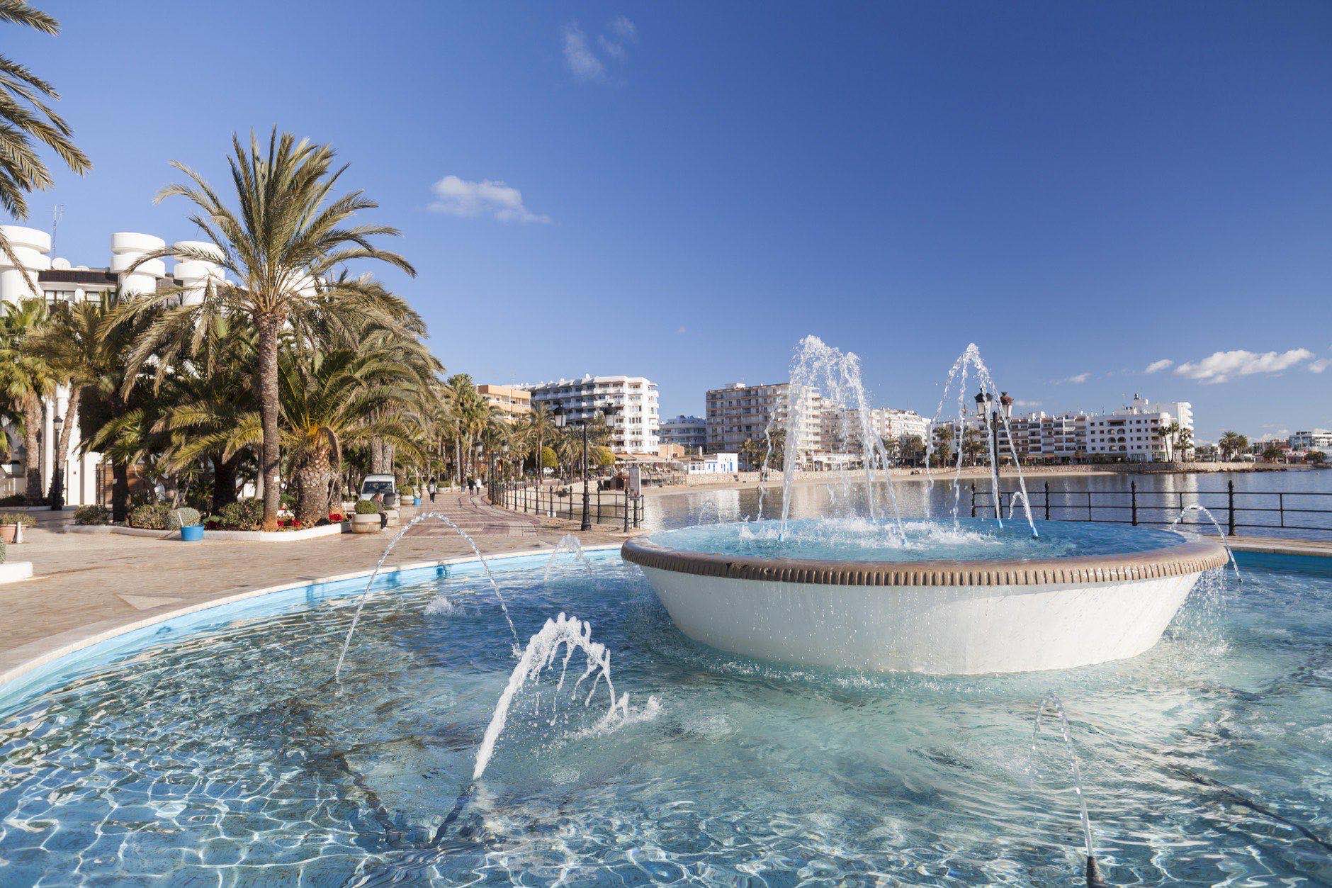 Maritime promenade and beach in balearic town of Santa Eularia des Riu, Ibiza, Spain.