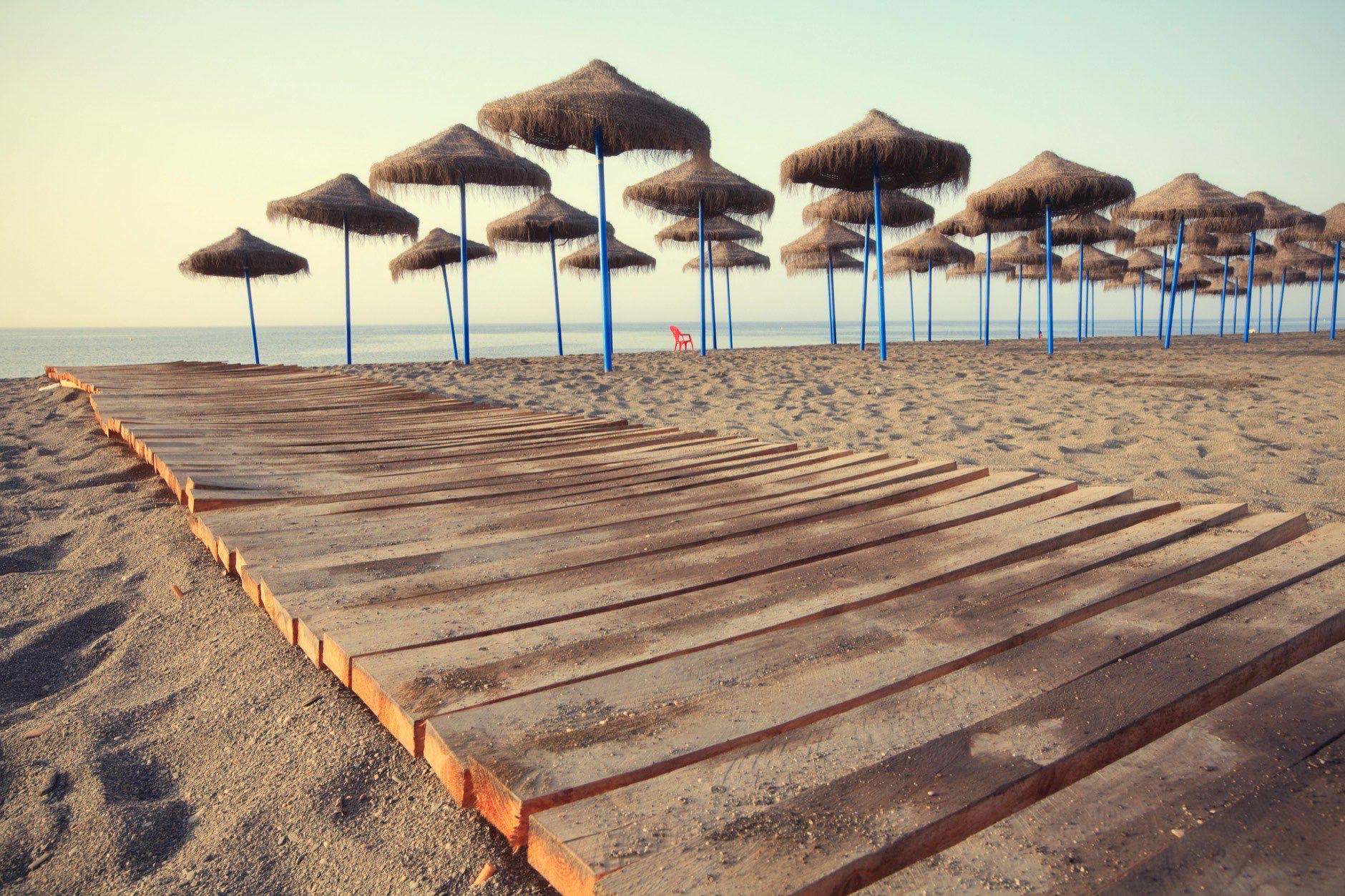 Mediteranean beach in early morning light. Torre del Mar , Andalucia , Spain