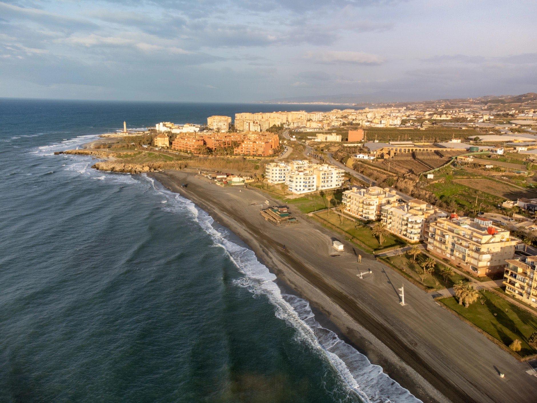 Aerial panoramic view on coastline in Torrox Costa, Costa del Sol, small touristic town between Malaga and Nerja, Andalusia, Spain. Overwinter in Spain.